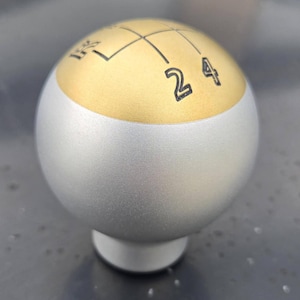 Custom Engraved Billet Aluminum with Brass inlay shift knobs for any vehicle