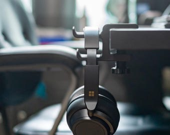 Soporte de sujeción para auriculares OB