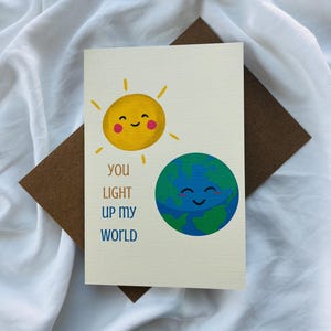 You Light Up My World Greeting Card - Pun Greeting Cards - Cute Card - Love Card - Sun/Earth Card - Card for Couples/Best Friends
