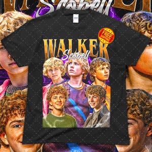 May include: Black t-shirt featuring a graphic of Walker Scobell with the text "WALKER Scobell" in gold. The design includes multiple images of the actor with a vintage, retro style. A "FREE SHIPPING" sticker is visible.