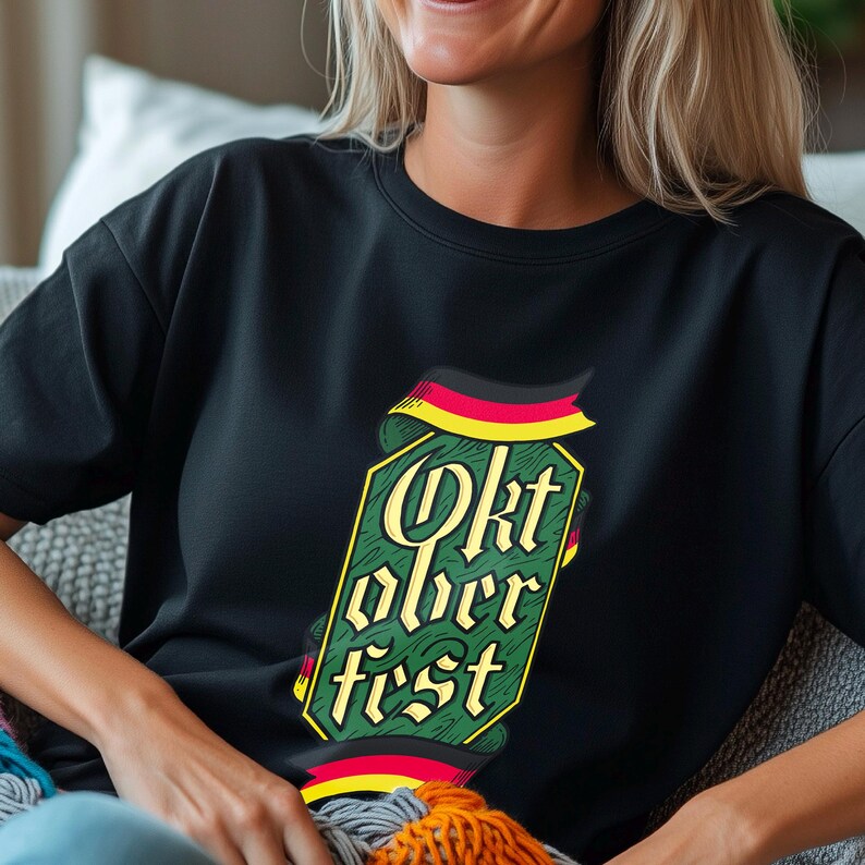May include: Black t-shirt with a green, yellow, and red graphic that says "Oktoberfest". The graphic is in a banner shape with the German flag colors. The shirt is a crew neck and has short sleeves.