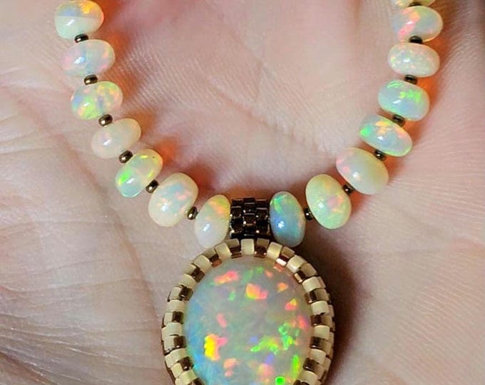 Featured listing image: Gorgeous, Large, Solid, Precious, Lt. Golden Ethiopian Opal Pear w/Full Spectrum Play-of-Color. Fiery Opal & Padparadscha Sapphire Gem Beads