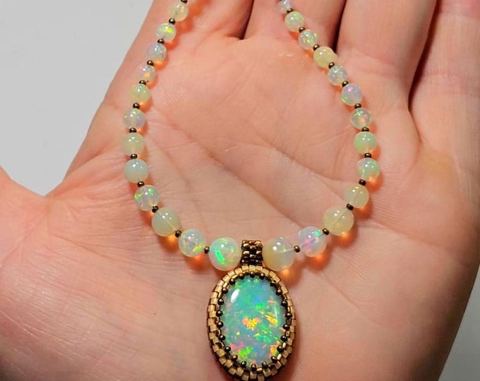 Featured listing image: Large Light-Gold Ethiopian Opal Cabochon, and Graduated Round Opal Beaded Necklace