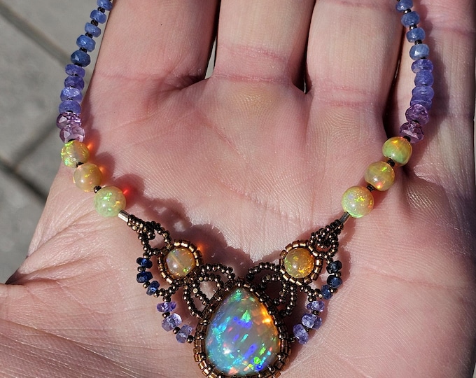 Featured listing image: Ethiopian Opal Pear Pendant: Amethyst Tanzanite, Sapphire, and Emerald Beaded Necklace
