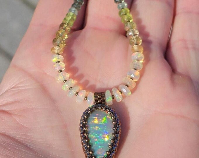 Featured listing image: Ethiopian Opal, w/Striated Patterns in the Full-Spectrum Play-of-color. Opal, Sapphire, Peridot, Multi-Kyanite, Apatite, Tanzanite Gem Beads