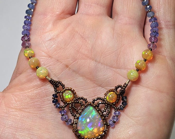 Featured listing image: Ethiopian Opal Pear Pendant: Amethyst Tanzanite, Sapphire, and Emerald Beaded Necklace