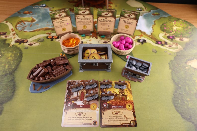 A full set of resource holders, open signs and card holders on an Everdell game board with resources in them.