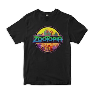 May include: Black t-shirt with a colorful graphic of a dinosaur silhouette with the text "Zootopia" inside. The graphic features various animals from the movie Zootopia.
