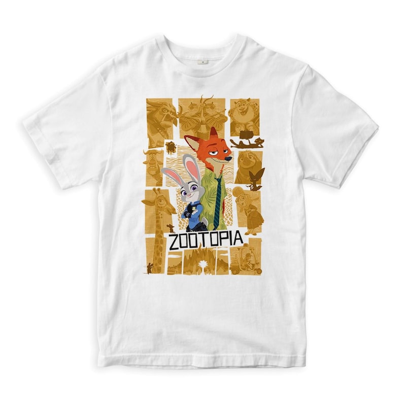 May include: White t-shirt with a graphic print of Nick Wilde and Judy Hopps from the movie Zootopia. The graphic is in a collage style with a gold background and the word "Zootopia" in bold letters.