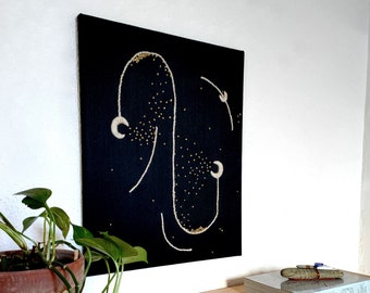 Textile artwork hand embroidery: Black, gold and natural white. Universe path Collection