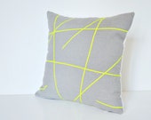 Neon yellow design on grey linen pillow cover