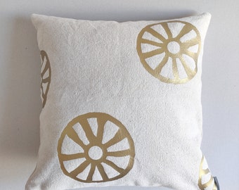 Modern home decor pillow cover printed design with eco vinyl in satin gold over a cotton grain sack in natural off white.