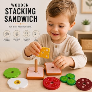 Pu&ograve; includere: Un set di gioco a forma di sandwich impilabile in legno con vari pezzi a forma di cibo tra cui pane, formaggio, lattuga, pomodoro e uovo. Il set include un perno centrale in legno per impilare i pezzi, con il testo WOODEN STACKING SANDWICH.