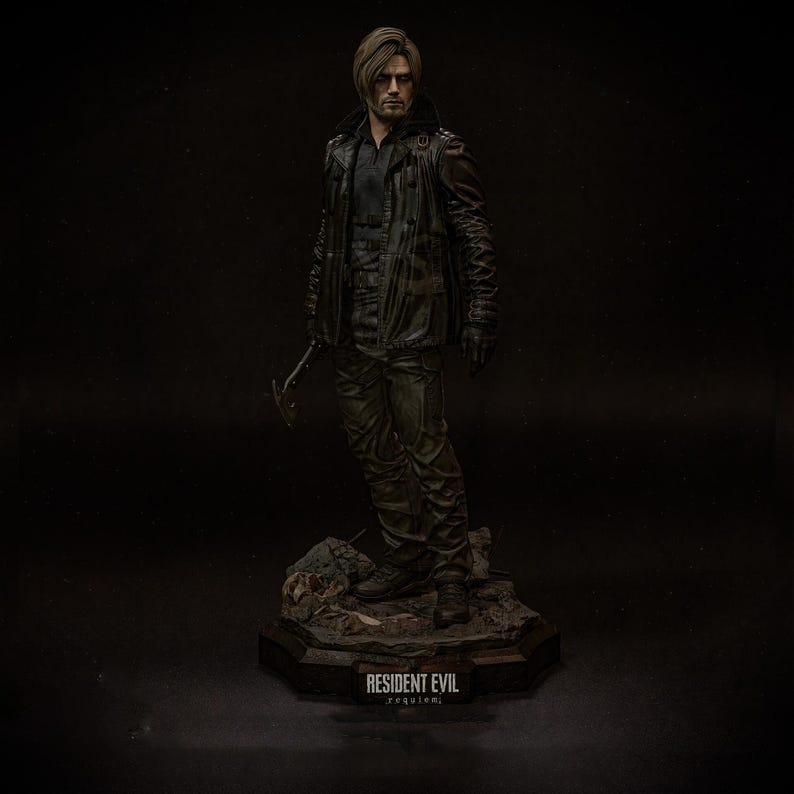 May include: A detailed figurine of a character from Resident Evil, standing on a rocky base. The figure wears a black leather jacket, pants, and gloves, holding a weapon. The base has the text "RESIDENT EVIL requiem."