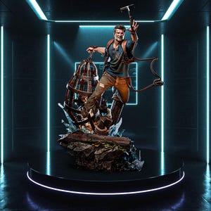 May include: A detailed statue of a character from the Uncharted video game series. The figure is dynamically posed, holding a pickaxe and a rope, with a cage and a detailed base. The statue is set on a black platform with neon blue lighting.