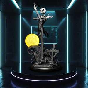 May include: A black and white statue of Jack Skellington from The Nightmare Before Christmas, posed with arms outstretched. The statue stands on a round, black platform with a glowing yellow moon and graveyard scene in the background. The scene is set in a dark room with neon blue lights.