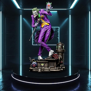 May include: A detailed statue of the Joker, a DC Comics supervillain, in a purple suit with a yellow vest and green hair. He holds a cane and a cup with a clown face. The statue stands on a mechanical base.