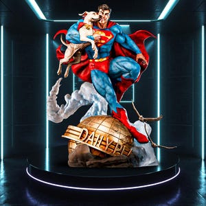 May include: A detailed statue of Superman in a dynamic pose, holding a dog. Superman is in his classic blue, red, and yellow costume, with a red cape. The statue rests on a globe with "DAILY PLANET" text. The base is a black platform.