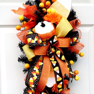 Halloween swag for front door, Candy corn wreath, Halloween decorations, Front porch fall decor, Halloween party decor, leopard designs