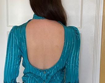 Reconstructed vintage 80s teal silky blouse with large open back, long sleeves, high neckline