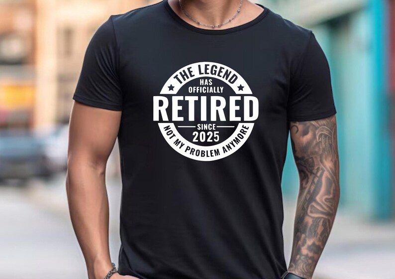 May include: Black t-shirt with a white circle graphic that says "The Legend Has Officially Retired Since 2025 Not My Problem Anymore".