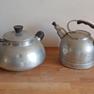 Pair of vintage water kettles, very decorative aluminium kettles