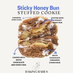 May include: A close-up of a sticky honey bun stuffed cookie. The cookie is made with a white chocolate cinnamon cookie base and is filled with a sticky honey bun. The cookie is topped with a cinnamon honey glaze.