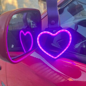 JDM Moon Tsurikawa LED neon handle accessory used in car interiors or as unique room decor, perfect for gift seekers, car lovers, and aesthetic enthusiasts. Brings a soft luminous glow that feels calming, magical, and modern.