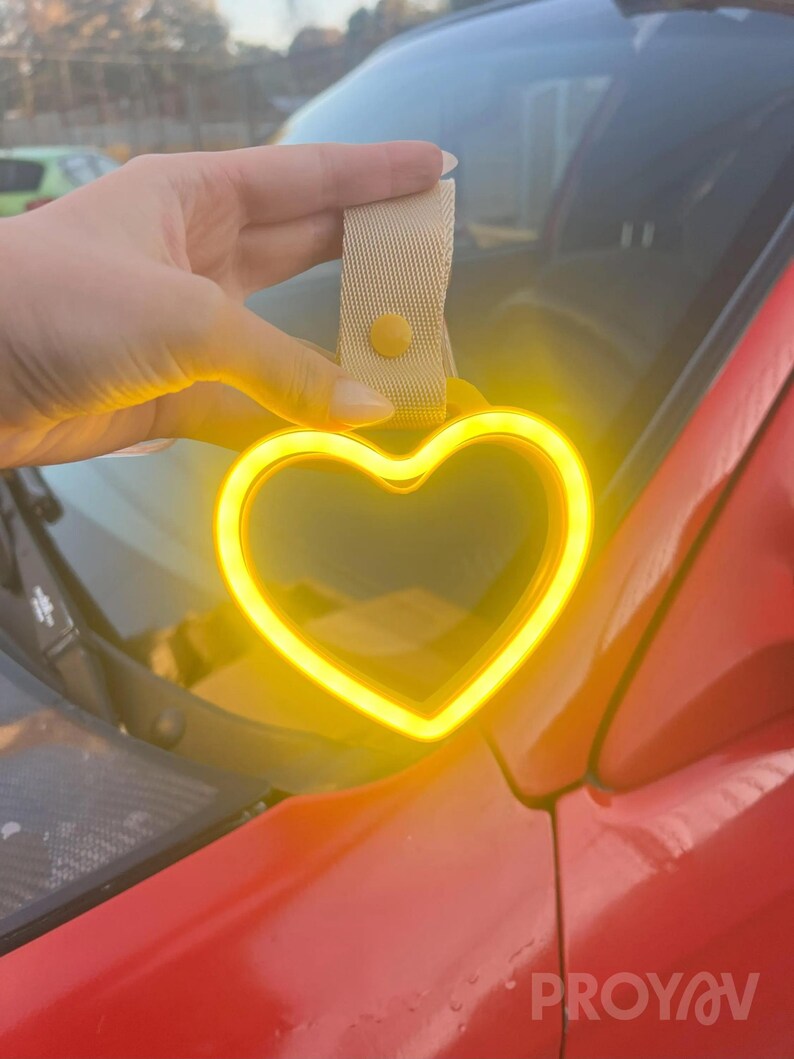 JDM Moon Tsurikawa LED neon handle accessory used in car interiors or as unique room decor, perfect for gift seekers, car lovers, and aesthetic enthusiasts. Brings a soft luminous glow that feels calming, magical, and modern.