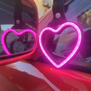 JDM Moon Tsurikawa LED neon handle accessory used in car interiors or as unique room decor, perfect for gift seekers, car lovers, and aesthetic enthusiasts. Brings a soft luminous glow that feels calming, magical, and modern.