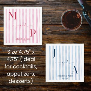 May include: Two square coasters measuring 4.75 inches by 4.75 inches. One features pink vertical stripes with the letters M and P, the text and, and the names Mandy & Paul with the date June 17, 2026. The other has blue stripes with J and A.