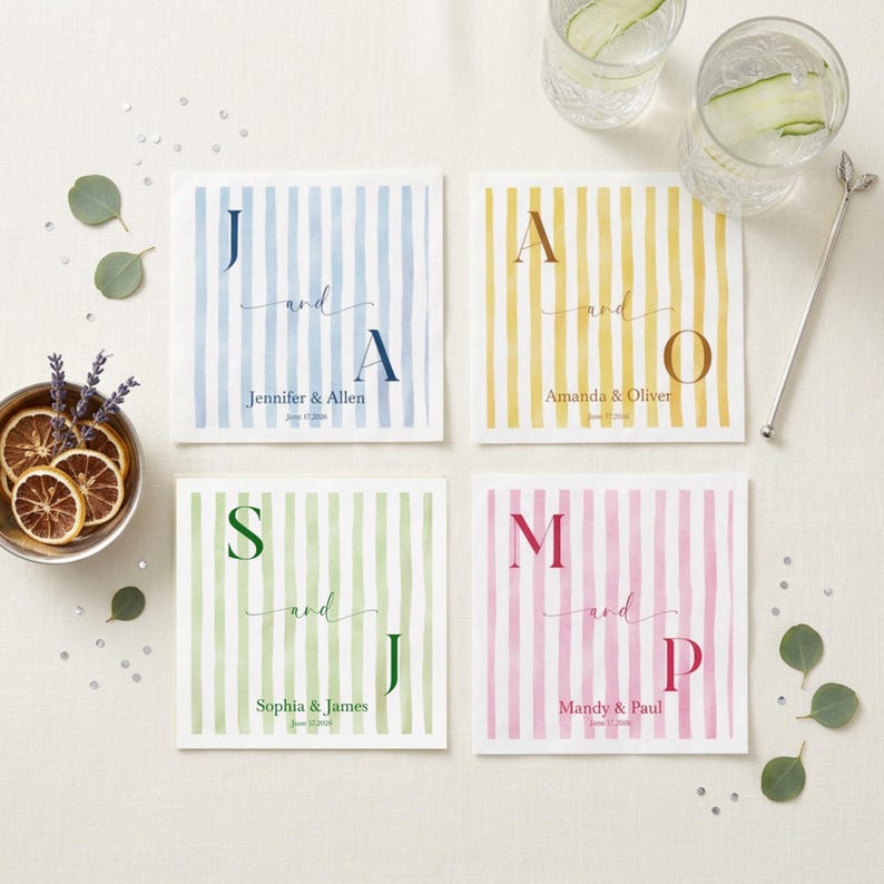 May include: Four square paper napkins featuring vertical stripes in light blue, yellow, light green, and pink. Each napkin displays two large initials, the word "and" in script, and names with dates: Jennifer & Allen, Amanda & Oliver, Sophia & James, and Mandy & Paul.