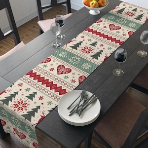Camino de mesa navideño escandinavo: estampado nórdico de renos y copos de nieve, algodón o poliéster, acogedora decoración navideña para la mesa de invierno.