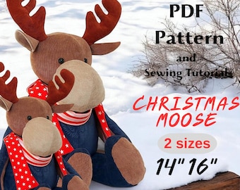 May include: Two plush Christmas moose toys with brown antlers, tan snouts, and blue denim bodies. They wear red and white star-patterned scarves. The image includes text that reads "PDF Pattern and Sewing Tutorials" and "CHRISTMAS MOOSE 2 sizes 14" 16".