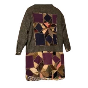 May include: A brown tweed jacket with a patchwork quilt design on the back. The quilt is made of various colors and patterns, including purple, blue, pink, and green.