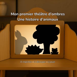 Può includere: Teatro delle ombre in legno con schermo retroilluminato che mostra sagome di animali. Il testo sullo schermo recita "Mon premier théâtre d'ombres Une histoire d'animaux". Il testo in basso recita "À imprimer • à découper • à jouer".
