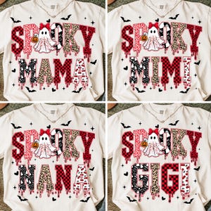 May include: Cream-coloured t-shirts with Halloween designs. Each shirt features the word "Spooky" in red and leopard print, with a ghost and pumpkin graphic. The shirts also have the words "Mama", "Mimi", "Nana", and "Gigi".