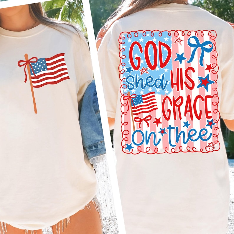May include: Cream-colored t-shirt featuring an American flag graphic on the front and a larger design on the back. The back design includes the text "GOD Shed HIS GRACE On *thee" in red and blue, with stars and decorative elements.