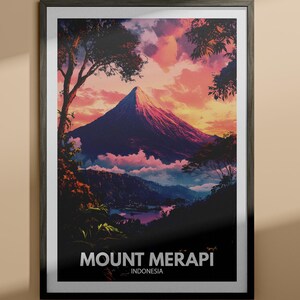May include: A framed poster featuring a colourful illustration of Mount Merapi in Indonesia. The mountain is depicted in shades of purple, pink, and blue, with a sunset sky in the background. The text "MOUNT MERAPI - INDONESIA" is printed at the bottom of the poster.
