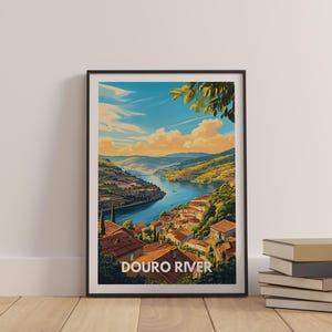 In a bright and airy kitchen, a Europe travel poster featuring the Douro River adds a splash of color and charm to the space. The poster's illustration of the river's scenic banks and terraced vineyards brings a touch of European flair to the room.