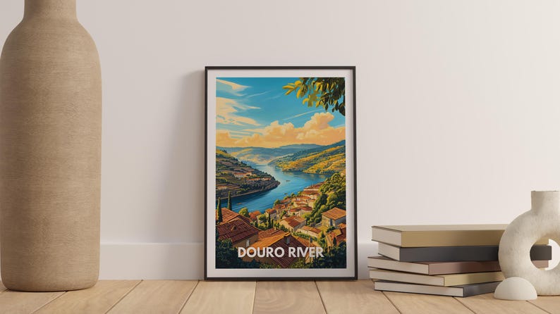 In a bright and airy kitchen, a Europe travel poster featuring the Douro River adds a splash of color and charm to the space. The poster's illustration of the river's scenic banks and terraced vineyards brings a touch of European flair to the room.