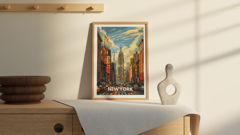 In a minimalist bedroom, a New York travel wall art decor is placed above the bed, framed in a sleek design. The vibrant colors and detailed illustration bring the beauty and charm of New York into the serene space.