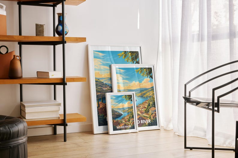 A Douro River travel poster is featured in a gallery wall in the living room, surrounded by other nature prints.