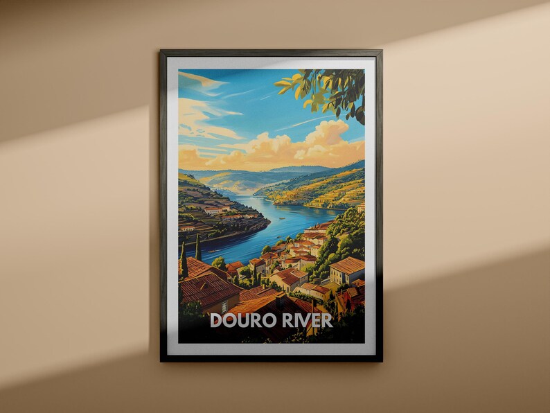 A beautifully framed Douro River poster in a cozy living room, surrounded by plush cushions and rustic furniture. The poster captures the serene beauty of the Douro, adding a touch of European elegance to the space.