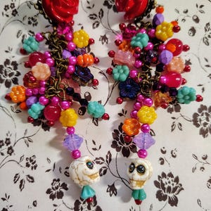 Gorgeous, lovely pair of Day of the Dead, Dia de los Muerto, Cinco de Mayo hand wire wrapped 4 inch long earrings. Beautiful colors.