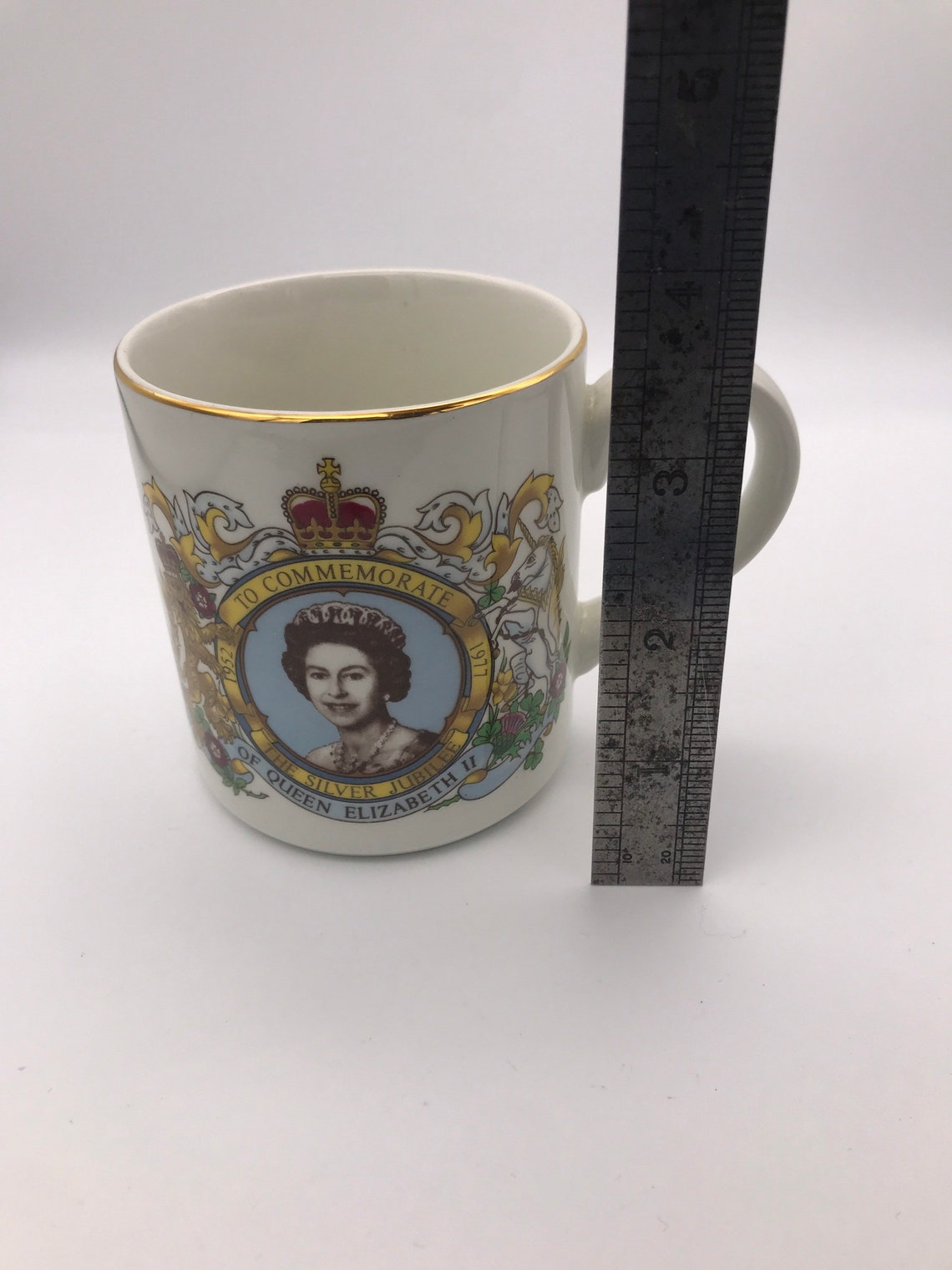 Pair of Queen Elizabeth II silver jubilee mugs made by Etsy