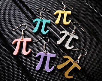May include: Six pairs of earrings featuring the mathematical symbol pi in various colors, including gold, silver, pink, purple, teal, and yellow.