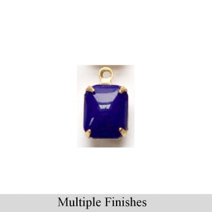 May include: A gold-toned pendant with a square, dark blue, faceted glass stone.
