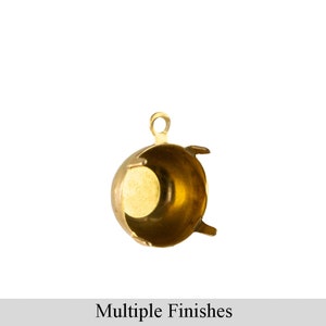 May include: A gold-toned metal bead cap with a round opening and three prongs. The cap is designed to hold a bead in place.