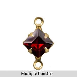 May include: Gold-toned connector with a red square-shaped gemstone.  Multiple Finishes.